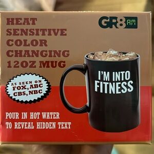 Heat sensitive color changing mug